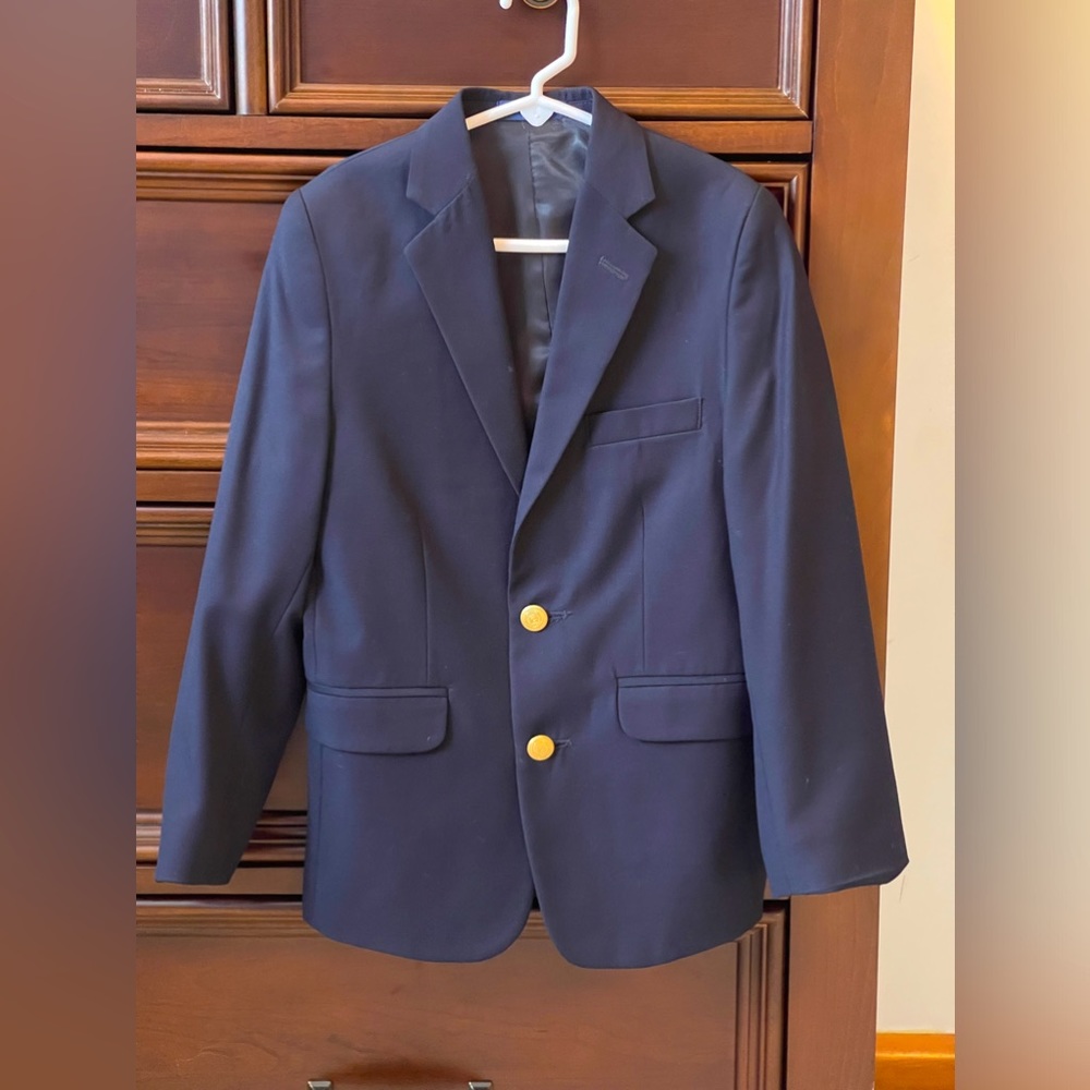 3 piece suit includes jacket, pants, and shirt. Size 8R